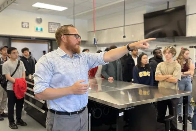 Professor directing students.