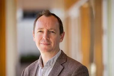 Prof Adam Clare portrait