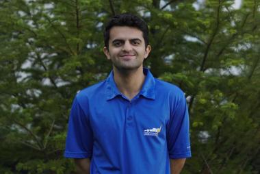 A headshot of Arman Hariri