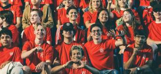 Students cheering at the bleachers