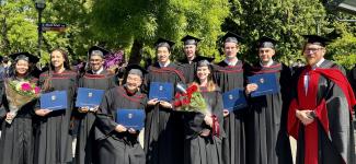 Students taking a graduation group photo