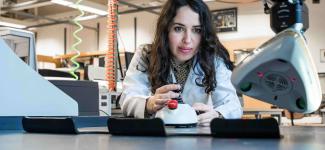 A woman working in a lab